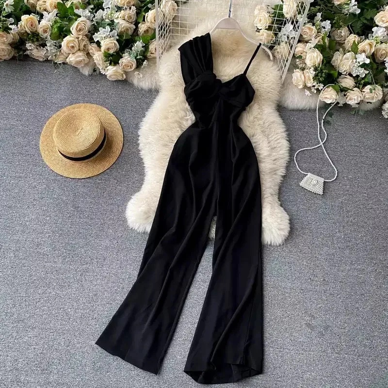 Asymmetrical off-the-shoulder twisted jumpsuit.