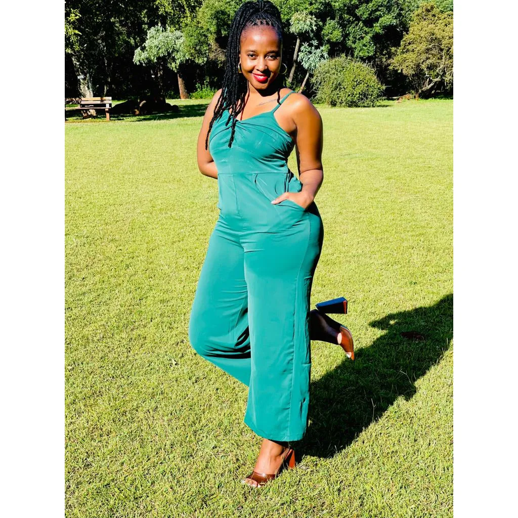 Asymmetrical off-the-shoulder twisted jumpsuit.