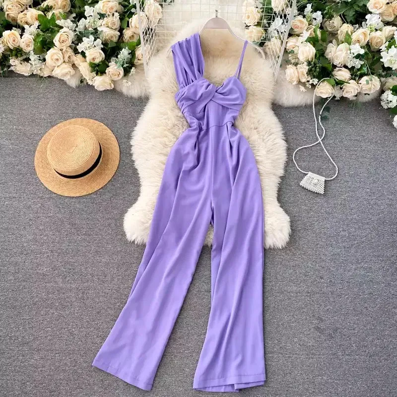 Asymmetrical off-the-shoulder twisted jumpsuit.
